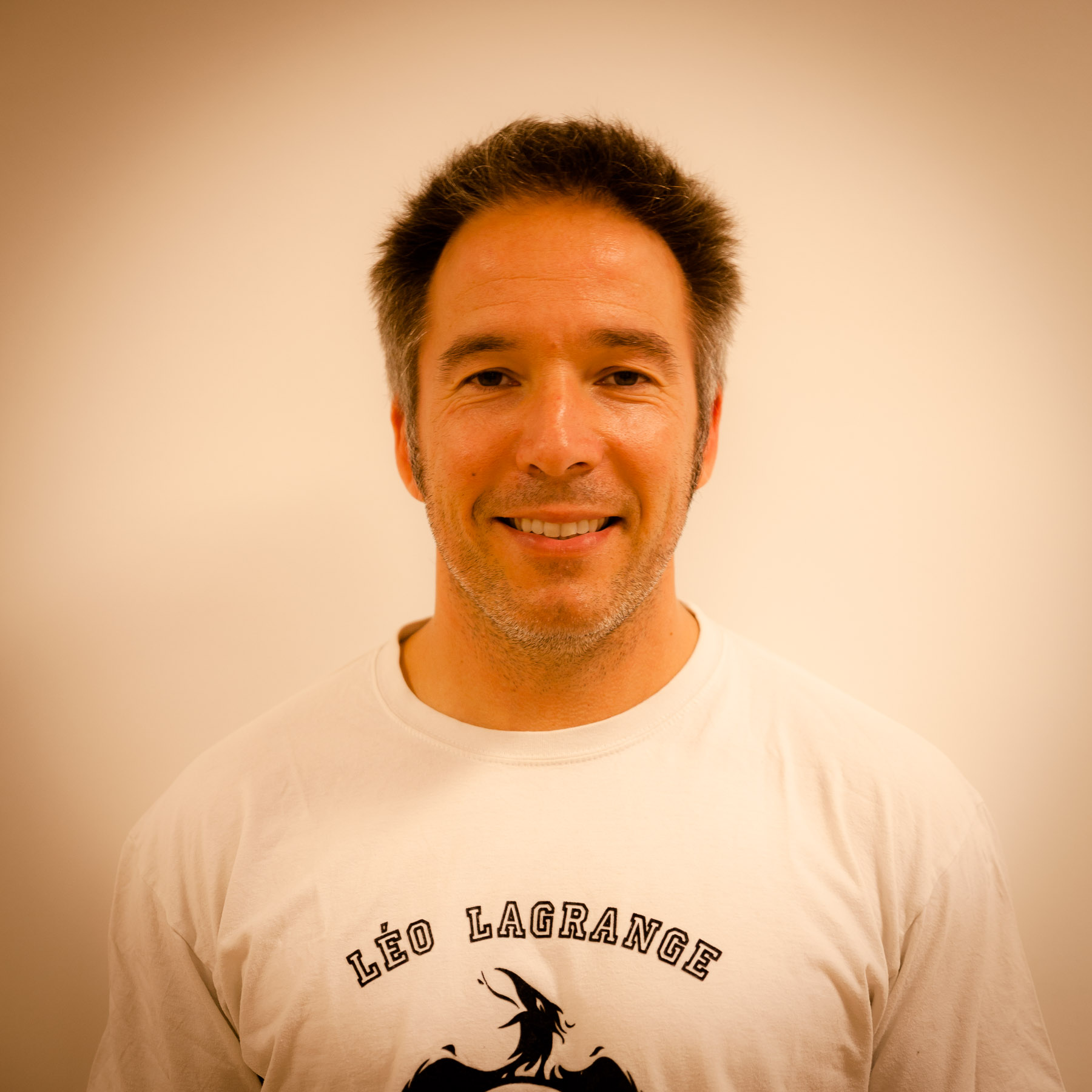 Club athlete portrait with Léo Lagrange identity on shirt