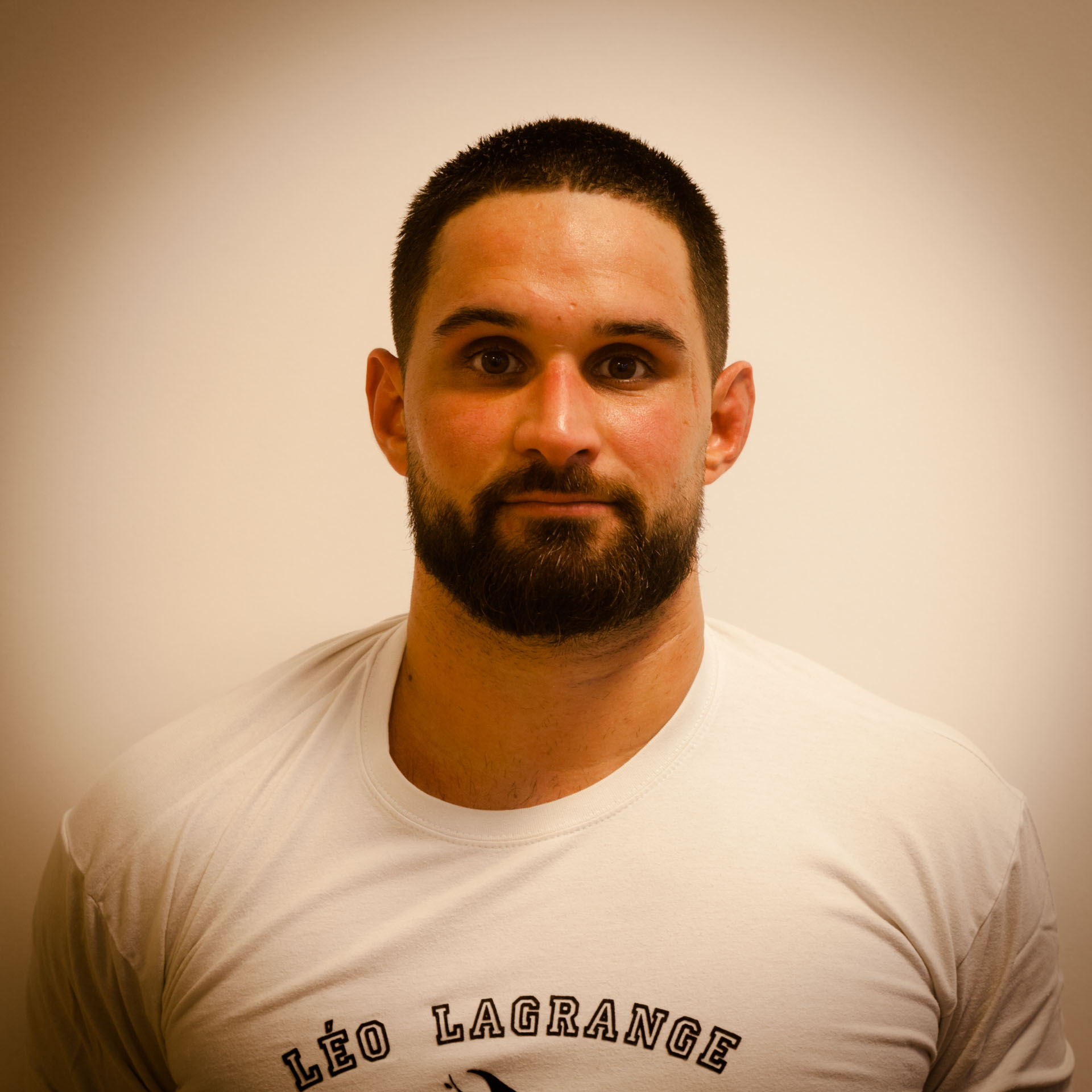 Club athlete portrait with Léo Lagrange identity on shirt